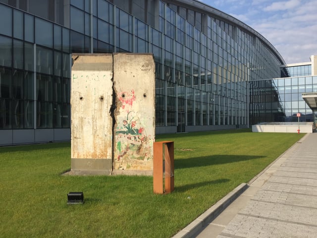 The fall of the Berlin Wall, a section of which is now displayed outside NATO Headquarters, marked a turning point in NATO's role in Europe.