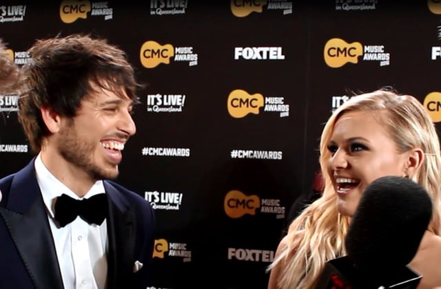 Morgan Evans and Kelsea Ballerini during a Planet Country interview on the CMC Awards red carpet in March 2016 around the time their relationship started.