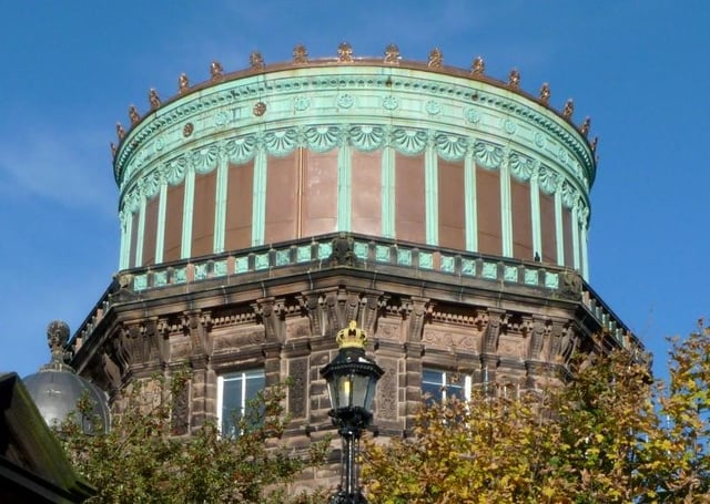 The East Tower of the Royal Observatory, Edinburgh. The contrast between the refurbished copper installed in 2010 and the green color of the original 1894 copper is clearly seen.
