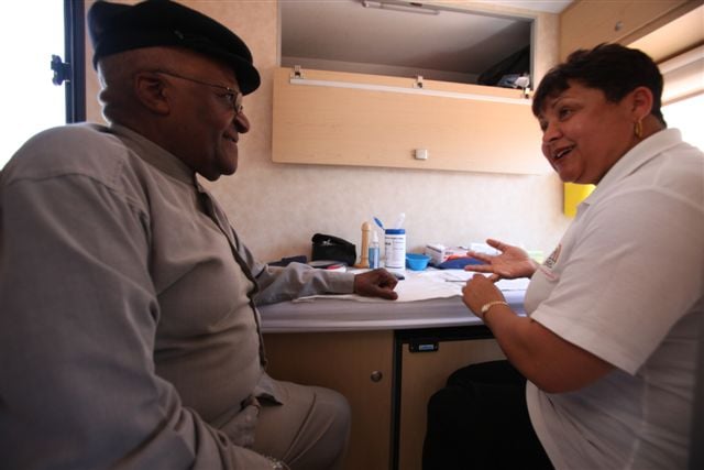 Desmond Tutu gets an HIV test on The Desmond Tutu HIV Foundation's Tutu Tester, a mobile test unit