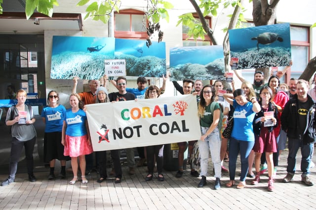 Protesting damage to the Great Barrier Reef caused by climate change in Australia
