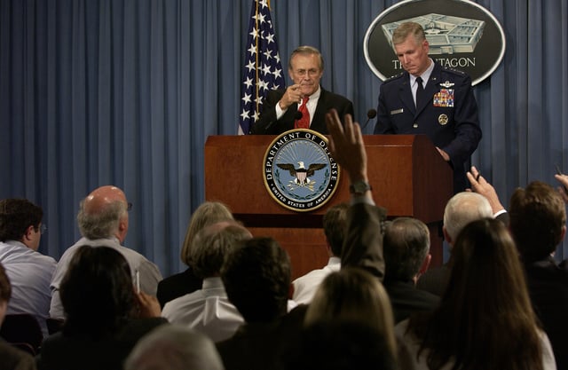 Secretary Rumsfeld responds to a reporter's question during a Pentagon press briefing.