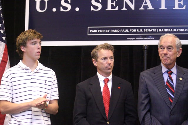 Paul at a rally in Erlanger, Kentucky, on October 2, 2010, along with his son, Senator Rand Paul of Kentucky, and his grandson, William Paul (pictured from right to left)