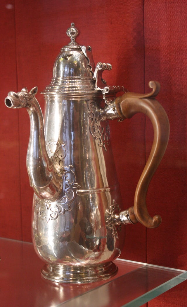 Silver chocolate pot with hinged finial to insert a molinet or swizzle stick, London 1714–15 (Victoria and Albert Museum)