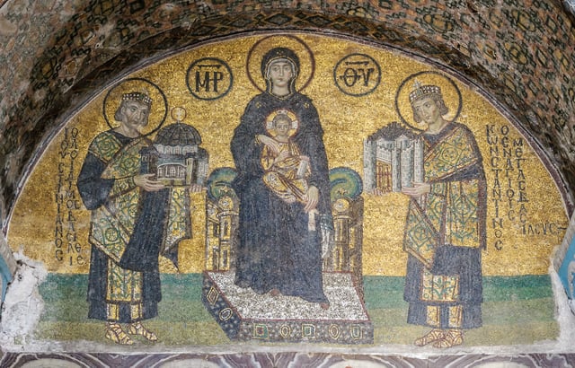 Hagia Sophia mosaic depicting the Virgin Mary holding the Child Christ on her lap. On her right side stands Justinian, offering a model of the Hagia Sophia. On her left, Constantine I presents a model of Constantinople.