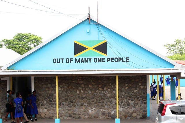 Jamaica motto on a building at Papine High School in Kingston, Jamaica