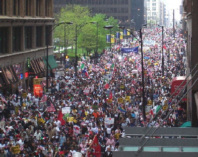 A rally on May Day 2006 in Chicago. The protests began in response to proposed legislation known as H.R. 4437, which would raise penalties for illegal immigration and classify undocumented immigrants and anyone who helped them enter or remain in the US as felons.