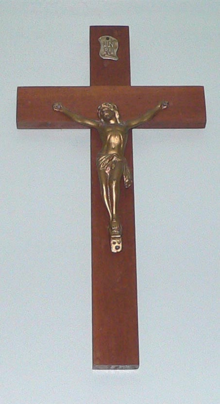 A crucifix, considered in Christian tradition as a defense against demons, as the holy sign of Christ's victory over every evil