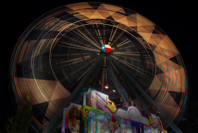 Texas Star ferris wheel spinning at night