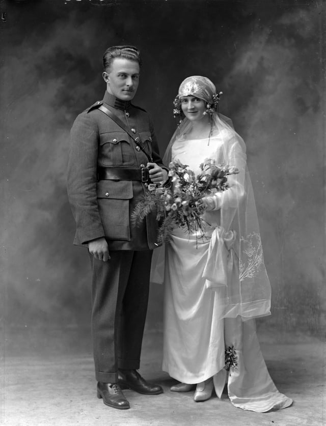 Wedding of Major Michael Joseph Bishop and Patricia Foley, 1924. "Major" Bishop (ranks were not fully standardised in the 1920s) was actually a Colonel, as indicated by the three dark bands on his collar.