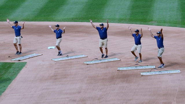 The grounds crew at Yankee Stadium dancing to "Y.M.C.A."