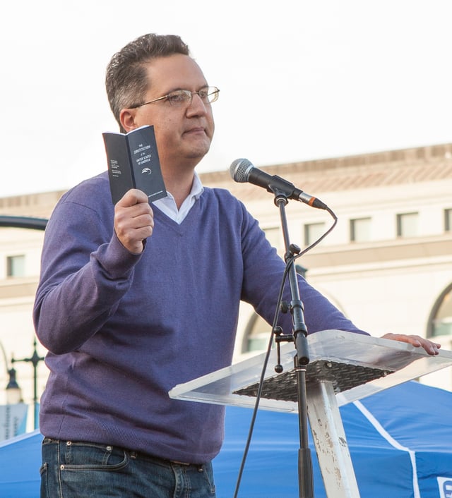 Abdi Soltani, executive director of Northern California ACLU, speaks at a San Francisco protest of the US immigration ban