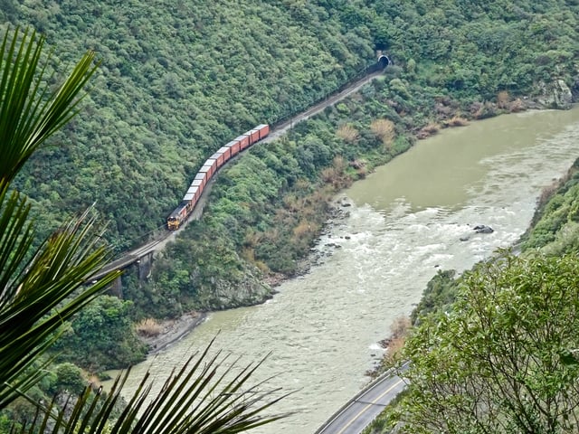 Westbound train in Manawatu Gorge, viewed from White Horse Rapids lookout, Manawatu Gorge Track