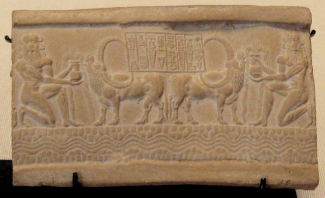 Impression of a cylinder seal of the Akkadian Empire, with label: "The Divine Sharkalisharri Prince of Akkad, Ibni-Sharrum the Scribe his servant". The long-horned buffalo is thought to have come from the Indus Valley, and testifies to exchanges with Meluhha, the Indus Valley civilization. Circa 2217-2193 BCE. Louvre Museum.