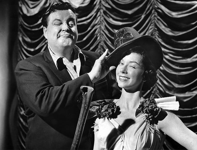 Gleason and June Taylor dancer Margaret Jeanne get ready for St. Patrick's Day 1955