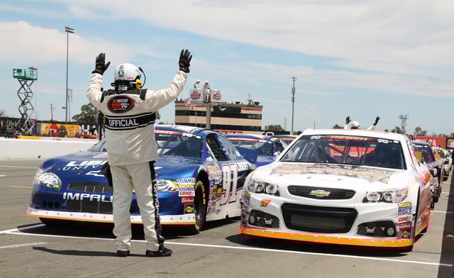 A Gen-4 Chevrolet Impala (left) and Gen-6 Chevrolet SS at Sonoma Raceway in 2015.