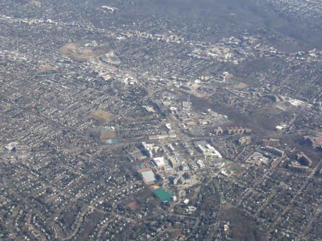 Aerial view of the American University campus, with Tenleytown in the background, in 2019