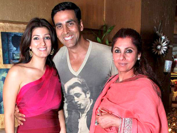 Kumar with his wife Twinkle Khanna (left) and mother-in-law, Dimple Kapadia (right).