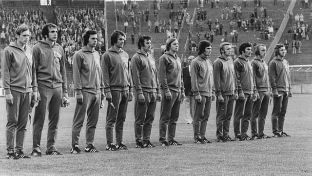 The East German football team lining up before a match in June 1974