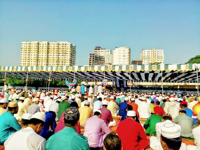 Bengali Muslims taking part in mass prayer of Eid al-Fitr