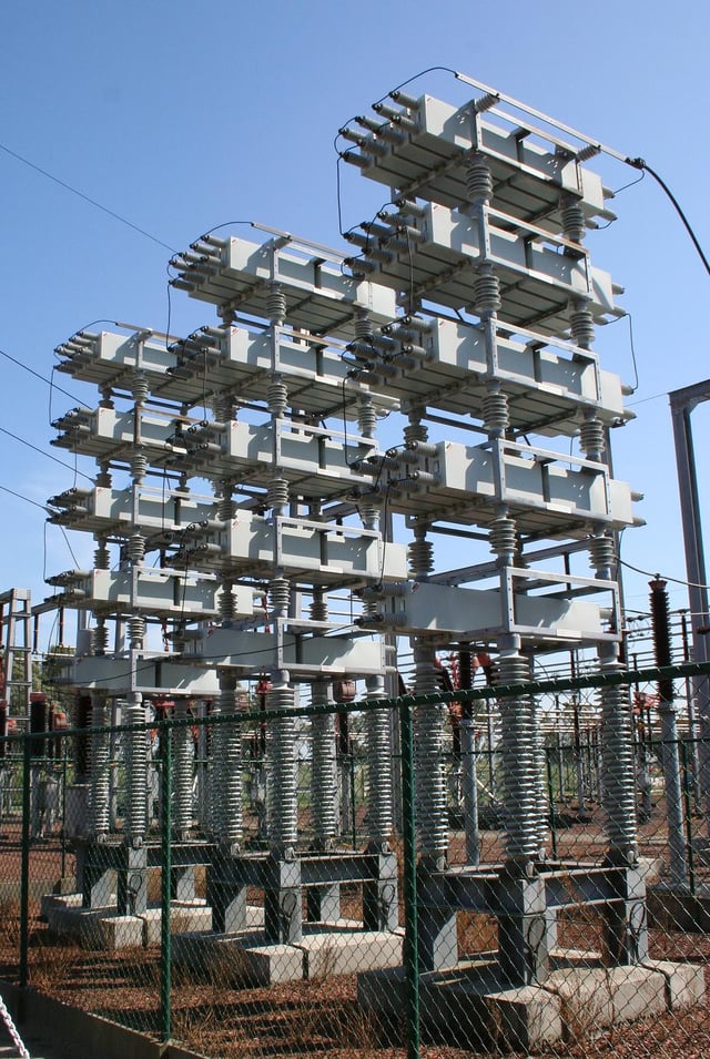 A high-voltage capacitor bank used for power factor correction on a power transmission system