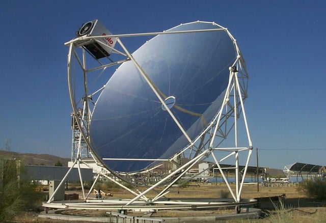 Point focus parabolic mirror with Stirling engine at its centre and its solar tracker at Plataforma Solar de Almería (PSA) in Spain