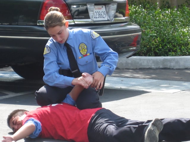 An LAPD cadet conducting a handcuffing drill