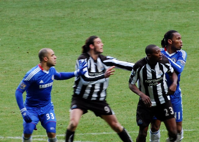 Alex and Didier Drogba marking Newcastle United's Andy Carroll and Shola Ameobi.