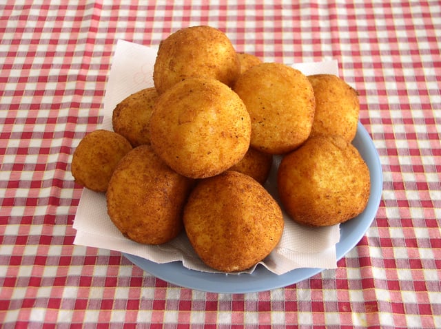 Arancine, rice balls fried in breadcrumbs