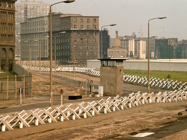 This section of the Wall's "death strip" featured Czech hedgehogs, a guard tower and a cleared area, 1977.