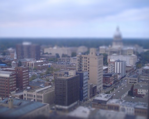 An image of Downtown Springfield with a view of the State capitol
