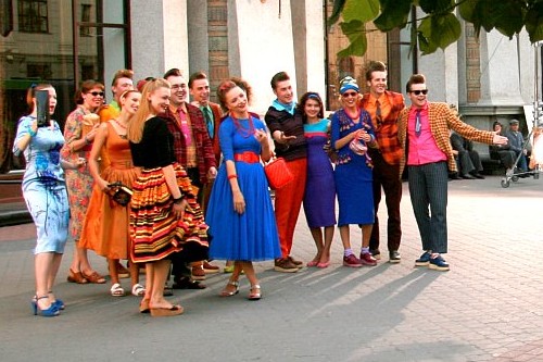 Modern actors dressed as 1950s Russian Beatniks or Stilyagi.
