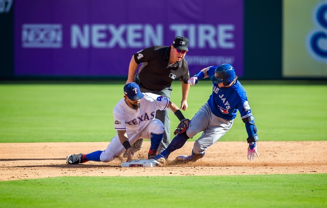 Josh Donaldson slides into second base during the first game of the 2016 ALDS.