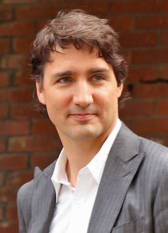 Justin Trudeau delivering a speech on a doorstep in Toronto's Little Italy, 2014