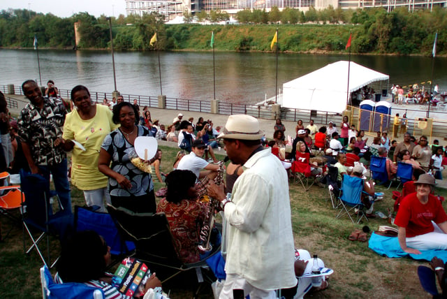 Kirk Whalum visiting the audience at a riverfront concert in 2007