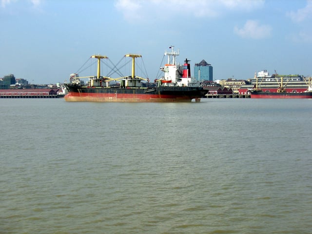 Cargo ships on the shores of Yangon River, just offshore of Downtown Yangon.