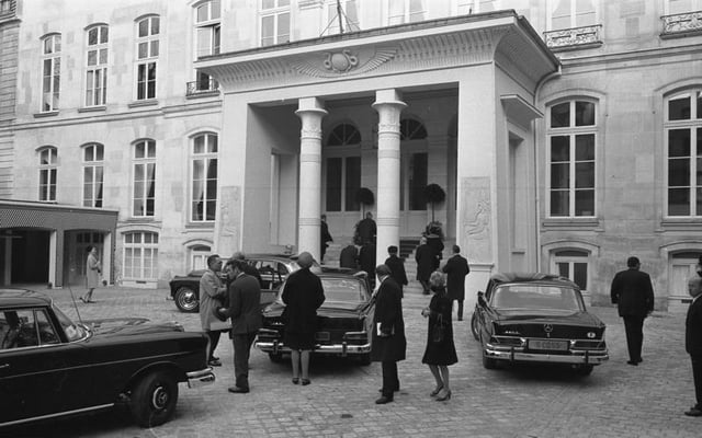 Guests arriving for the initiation of a new German Embassy building in Paris, 1968