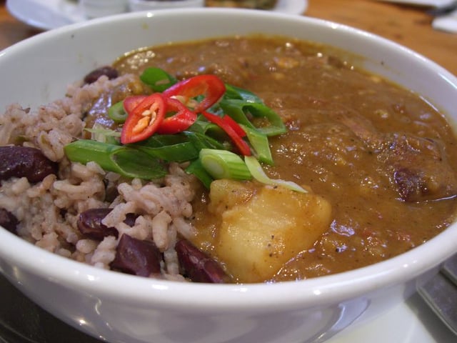 Jamaican curry goat with rice and peas