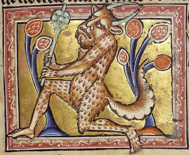 Medieval depiction of a satyr from the Aberdeen Bestiary, holding a wand resembling a jester's club. Medieval bestiaries conflated satyrs with western European wild men.