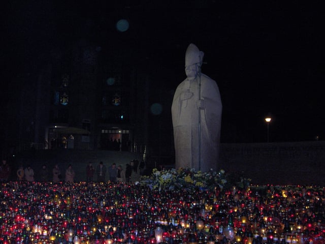 Candles around monument to Pope John Paul in Zaspa, Gdańsk at the time of his death