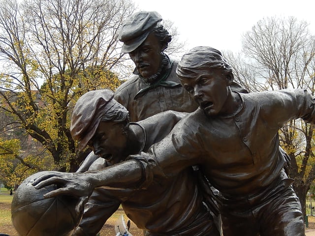 Statue outside the Melbourne Cricket Ground commemorating the origins of Australian rules football