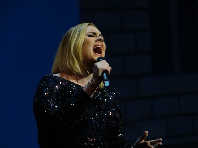 Adele singing at the Bridgestone Arena in Nashville, Tennessee during her Adele Live 2016 tour