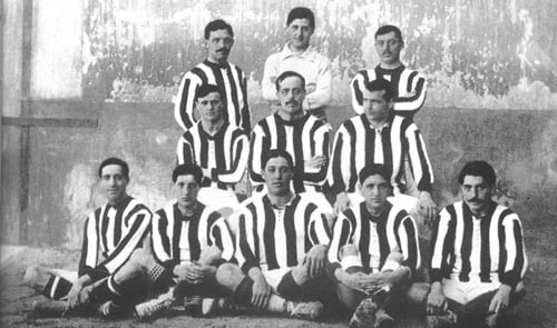 An Athletic Madrid lineup of 1911 in their new red and white kit