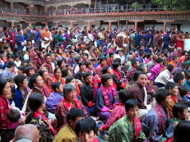 Bhutanese people in national dress at the Wangdi Phodrang festival.