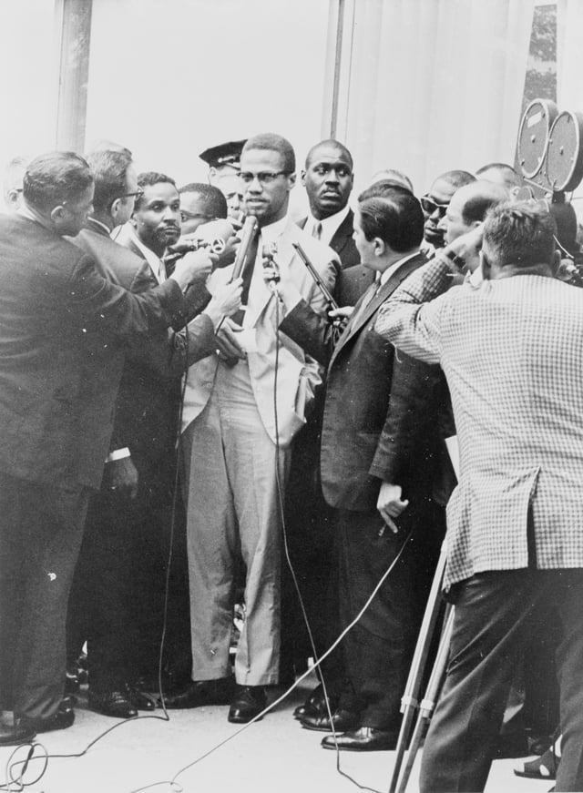 Malcolm X at a 1964 press conference