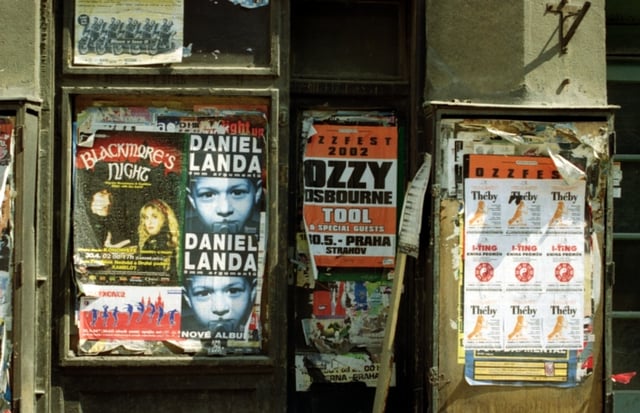 Ozzfest concert poster (middle) on a storefront door in Prague, Czech Republic (Summer 2002)