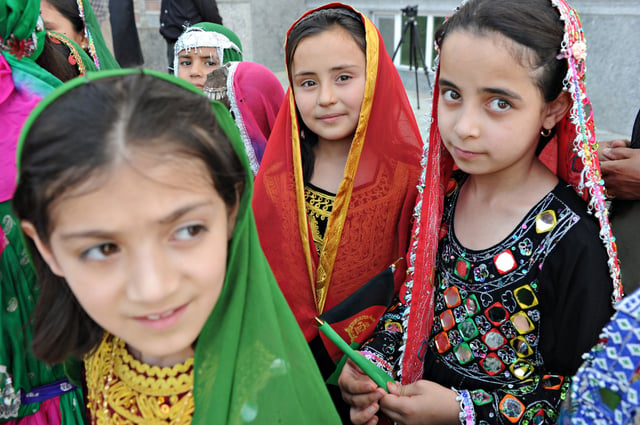 Ethnic Tajik girls in traditional clothing in Mazar-i-Sharif