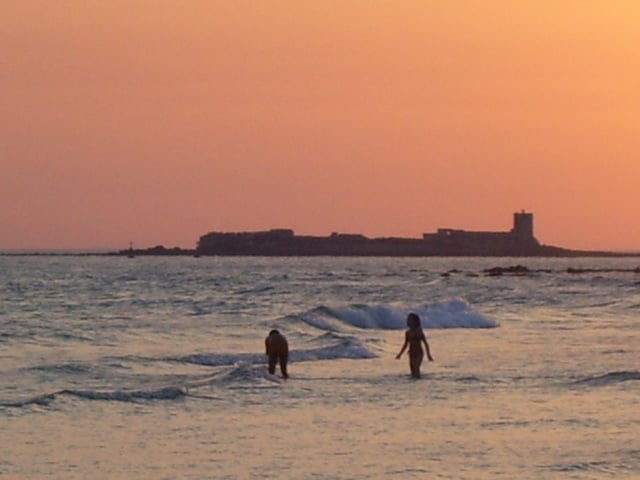 Castle of Sancti Petri, located in San Fernando, Cádiz. One of the largest components of the service sector is "sun and sand" tourism.