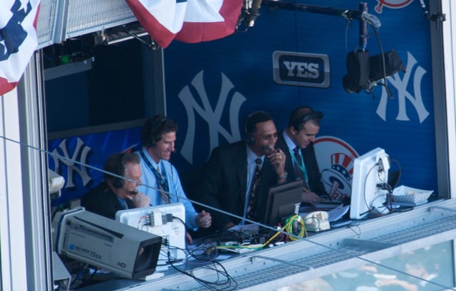 Announcers Michael Kay, Paul O'Neill, Ken Singleton, and Ryan Ruocco in the YES Network broadcast booth at Yankee Stadium in 2009