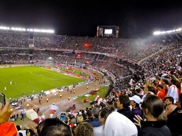 River Plate fans welcome the team in a superclásico in 2010.